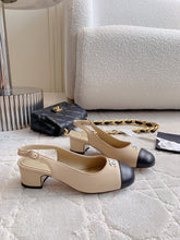 SLINGBACKS IN BEIGE CREAM MIX BLACK SHEEPSKIN